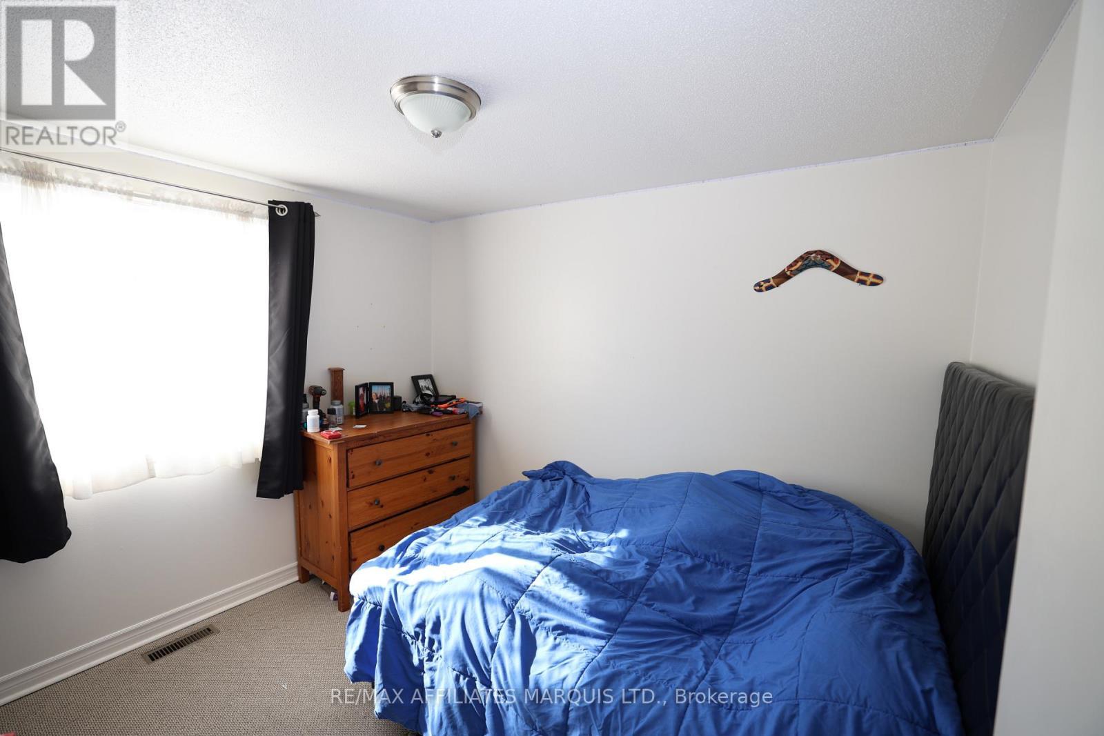 9 Sutton Drive, Edwardsburgh/Cardinal, ON - Indoor Photo Showing Bedroom