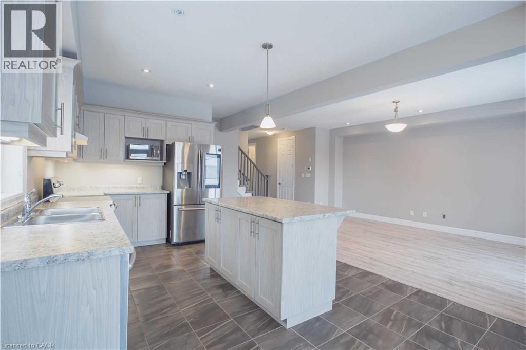 2825 Asima Drive, London, ON - Indoor Photo Showing Kitchen With Double Sink
