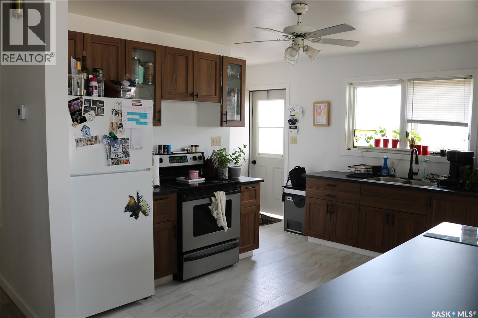 202 Main Street, Young, SK - Indoor Photo Showing Kitchen With Double Sink
