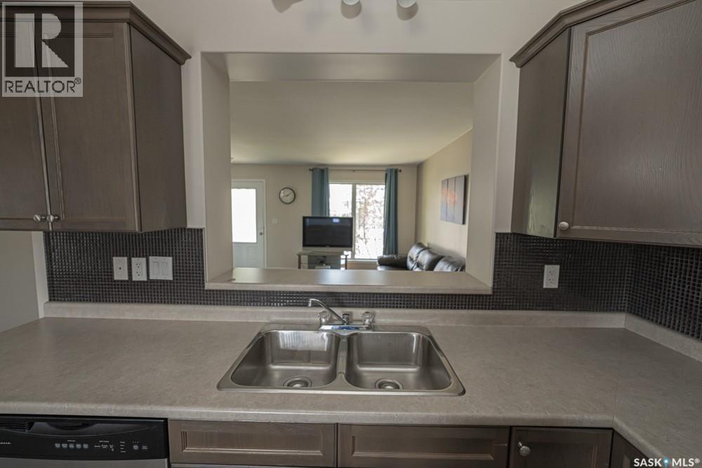 363 Levalley Cove, Saskatoon, SK - Indoor Photo Showing Kitchen With Double Sink
