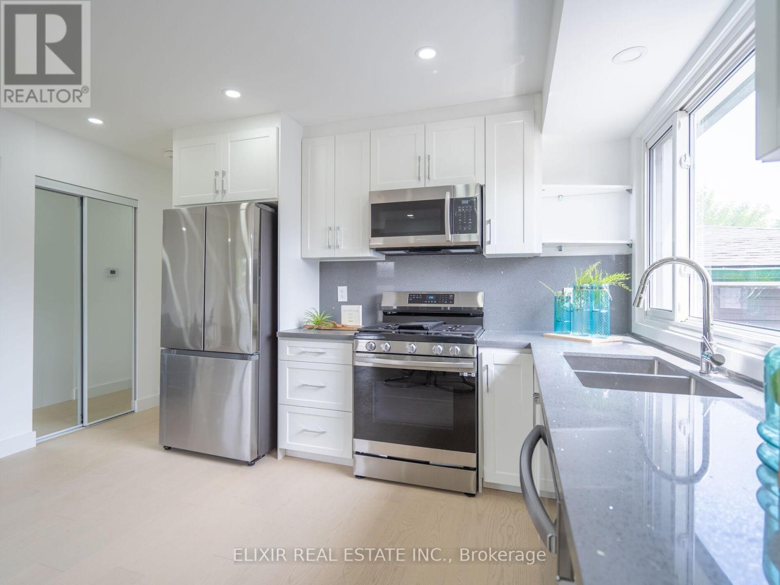 63 Champlain Avenue, Hamilton, ON - Indoor Photo Showing Kitchen With Double Sink