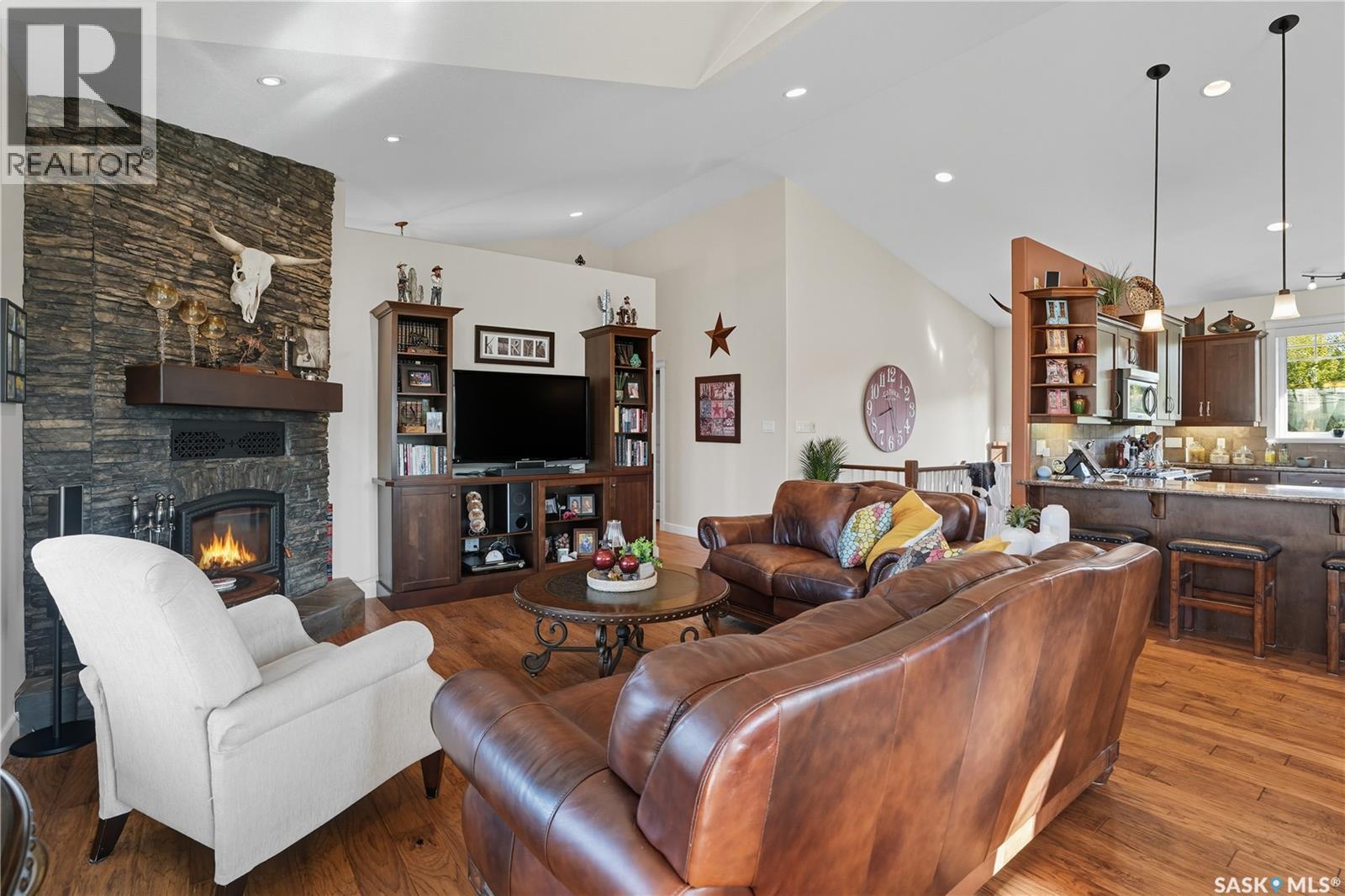 Kiryk Acreage, Buckland Rm No. 491, SK - Indoor Photo Showing Living Room With Fireplace