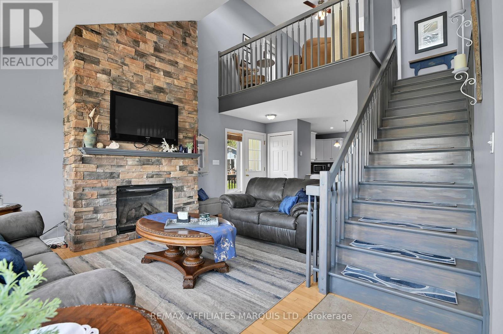 19414 Malibu Lane, South Glengarry, ON - Indoor Photo Showing Living Room With Fireplace