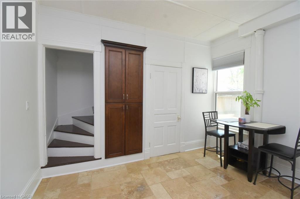 Light-toned tile flooring throughout - 89 Lynden Road, Lynden, ON