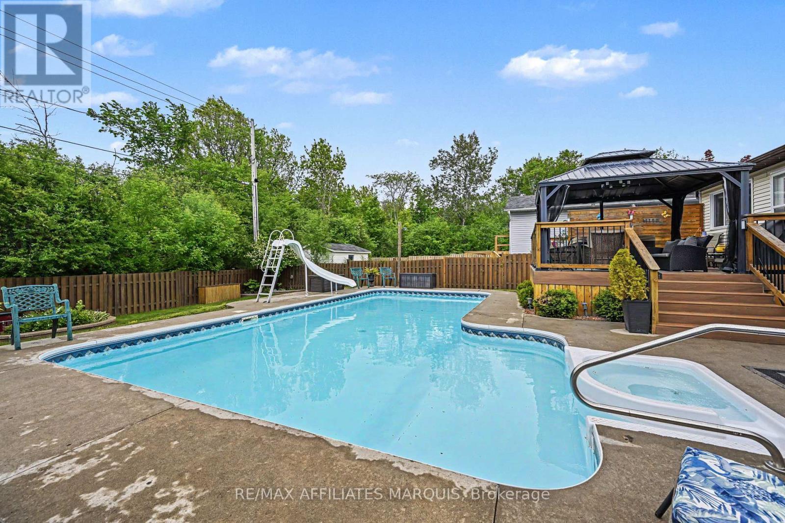 15 Pearl Street, Smiths Falls, ON - Outdoor With In Ground Pool With Deck Patio Veranda With Backyard