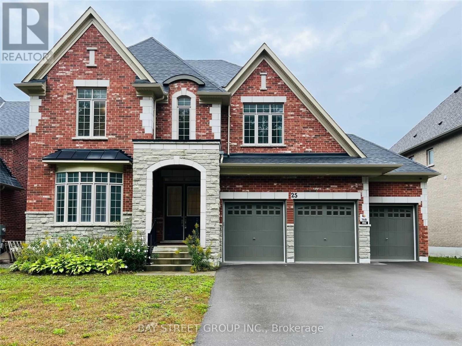 25 Mcisaac Drive, Springwater, ON - Outdoor With Facade