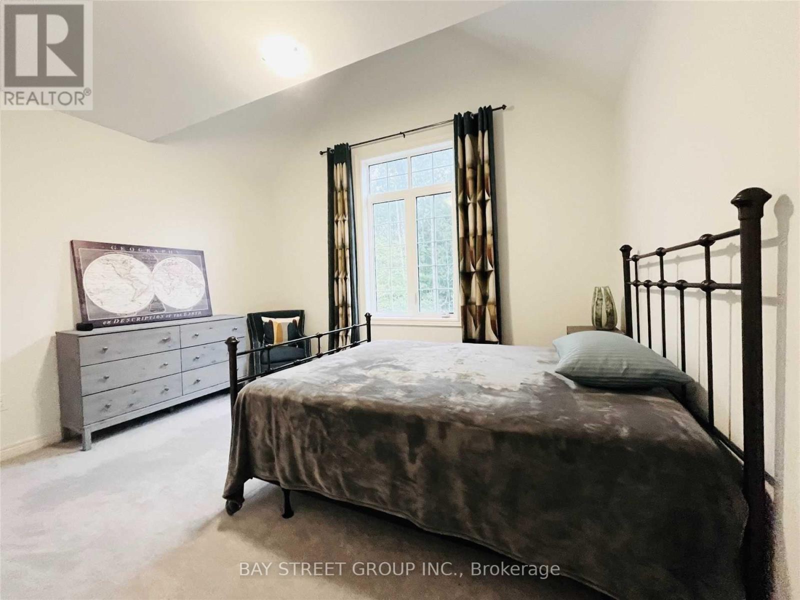 25 Mcisaac Drive, Springwater, ON - Indoor Photo Showing Bedroom