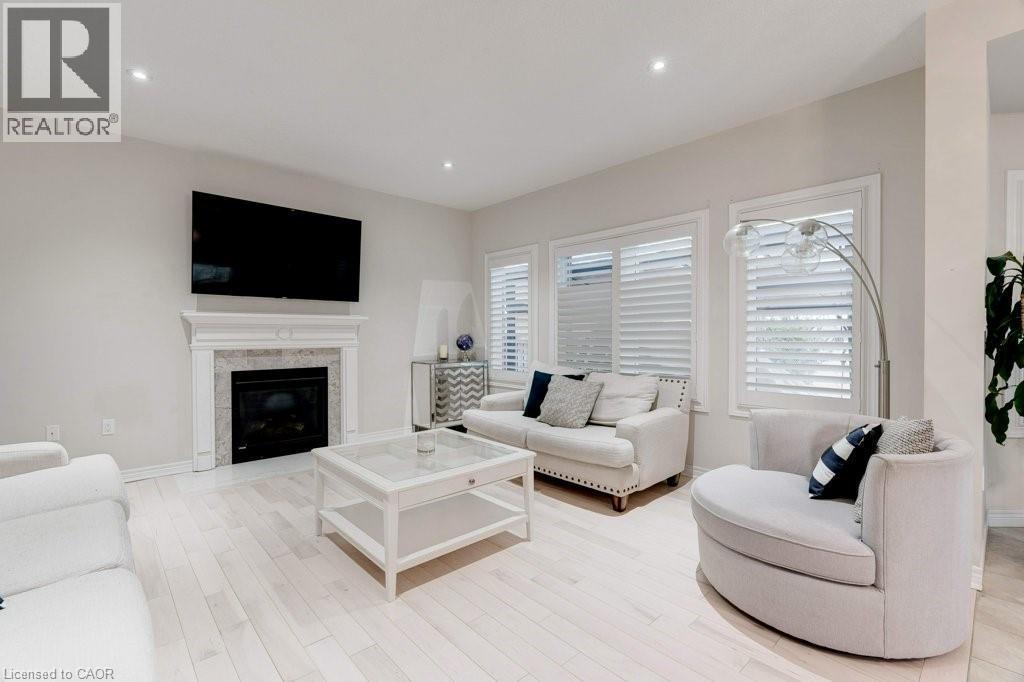 85 Showcase Drive, Hamilton, ON - Indoor Photo Showing Living Room With Fireplace