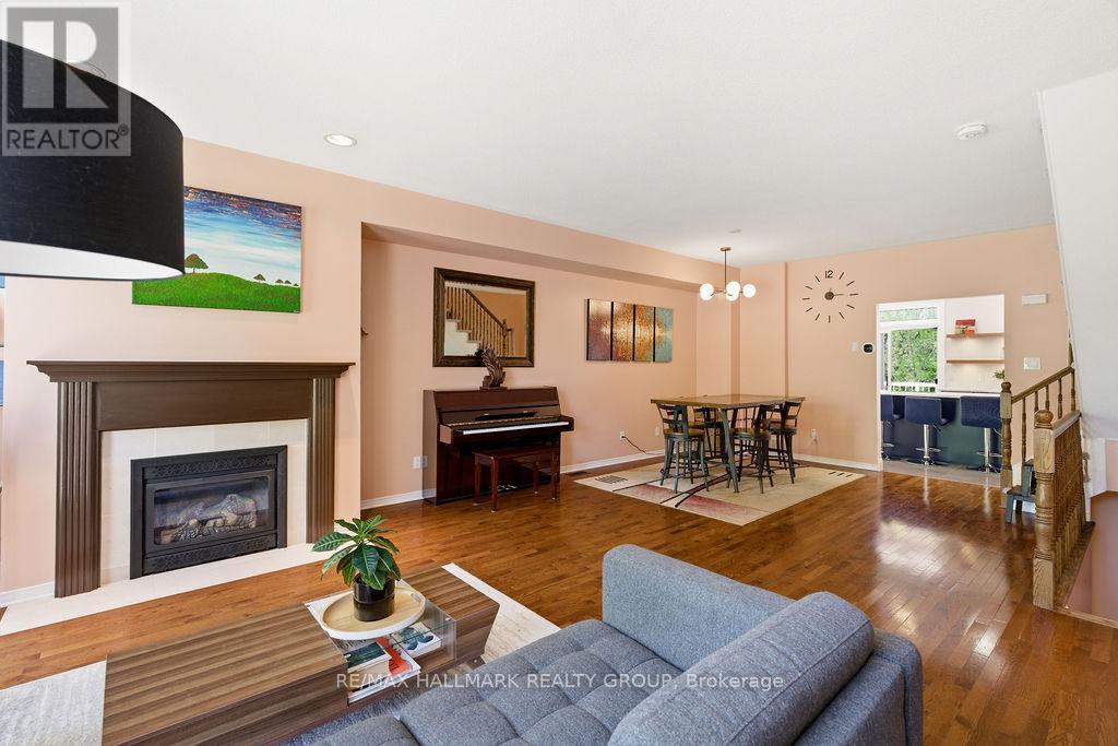 8 Pondside Private, Ottawa, ON - Indoor Photo Showing Living Room With Fireplace