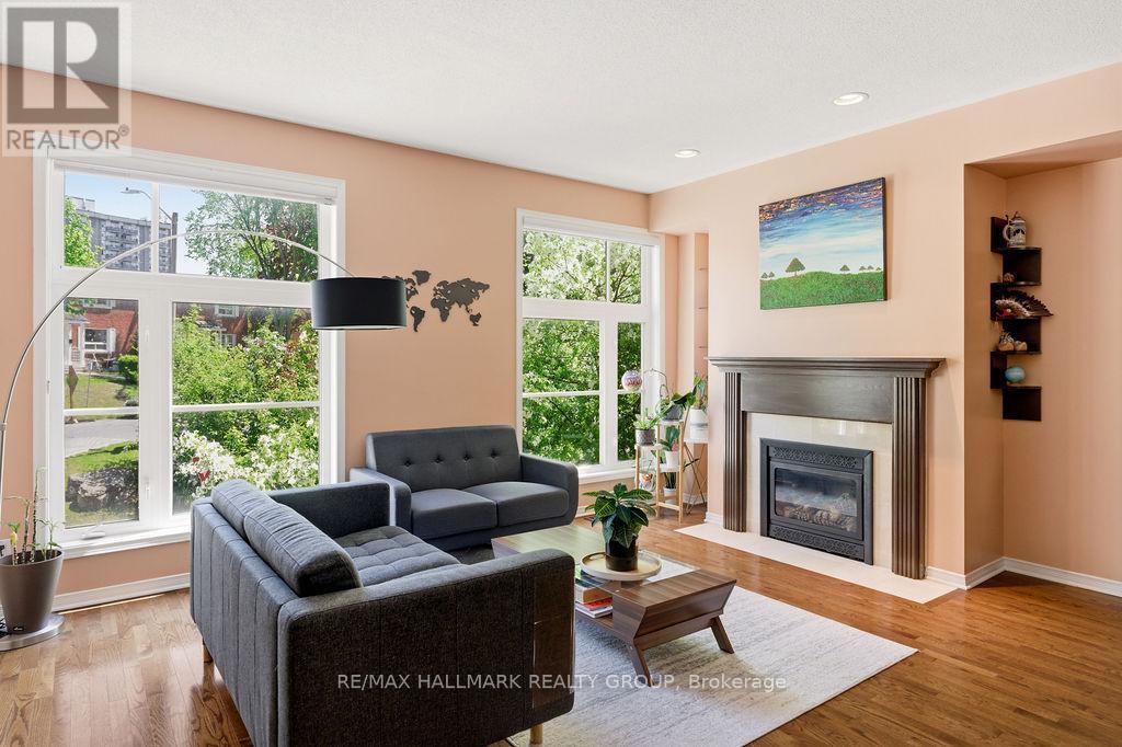 8 Pondside Private, Ottawa, ON - Indoor Photo Showing Living Room With Fireplace