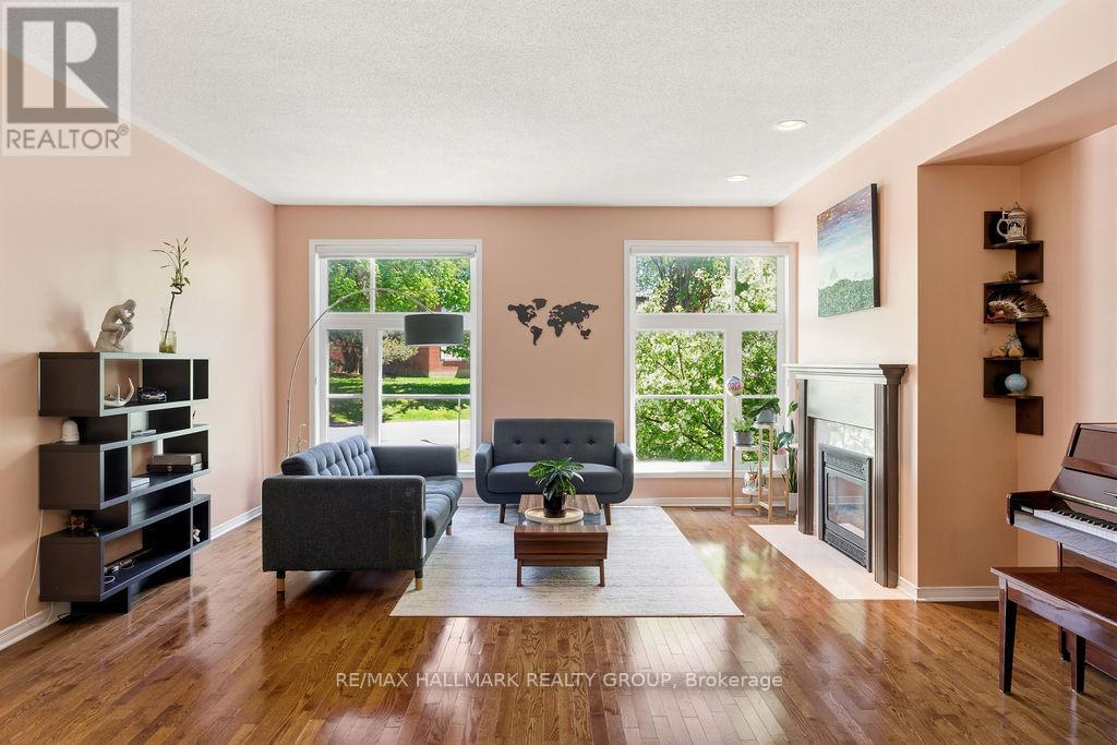 8 Pondside Private, Ottawa, ON - Indoor Photo Showing Living Room With Fireplace