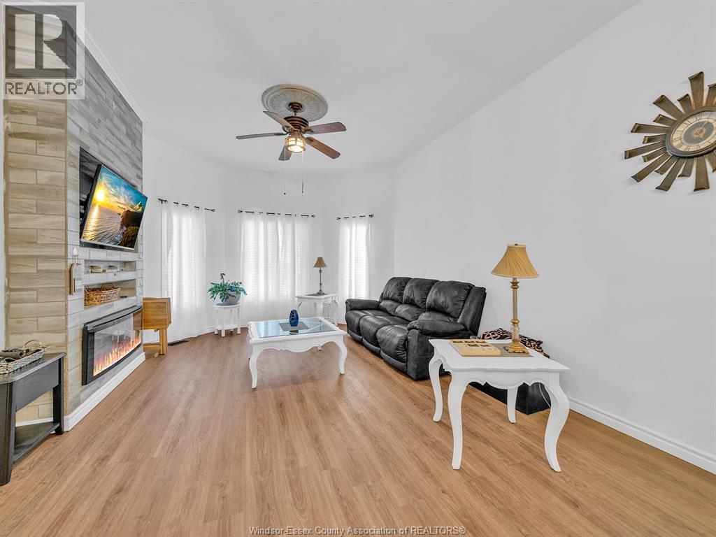 2115 Longfellow, Windsor, ON - Indoor Photo Showing Living Room With Fireplace
