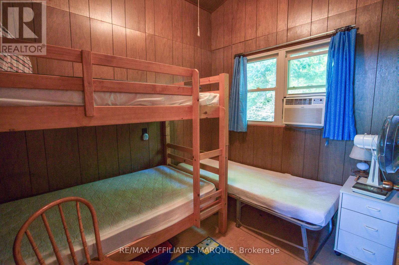 415 Yvon Lane, Rideau Lakes, ON - Indoor Photo Showing Bedroom
