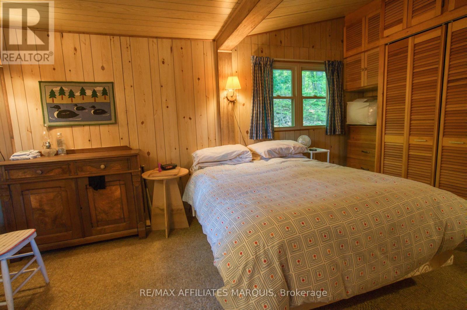415 Yvon Lane, Rideau Lakes, ON - Indoor Photo Showing Bedroom
