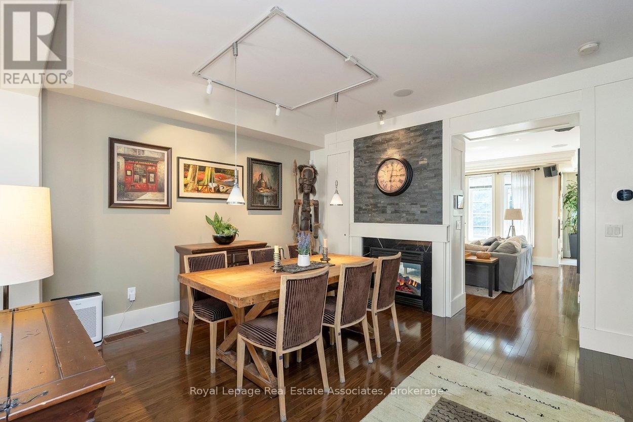 20 - 4135 Shipp Drive Ne, Mississauga, ON - Indoor Photo Showing Dining Room With Fireplace