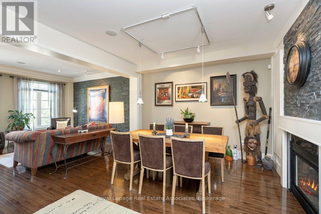 20 - 4135 Shipp Drive Ne, Mississauga, ON - Indoor Photo Showing Dining Room With Fireplace