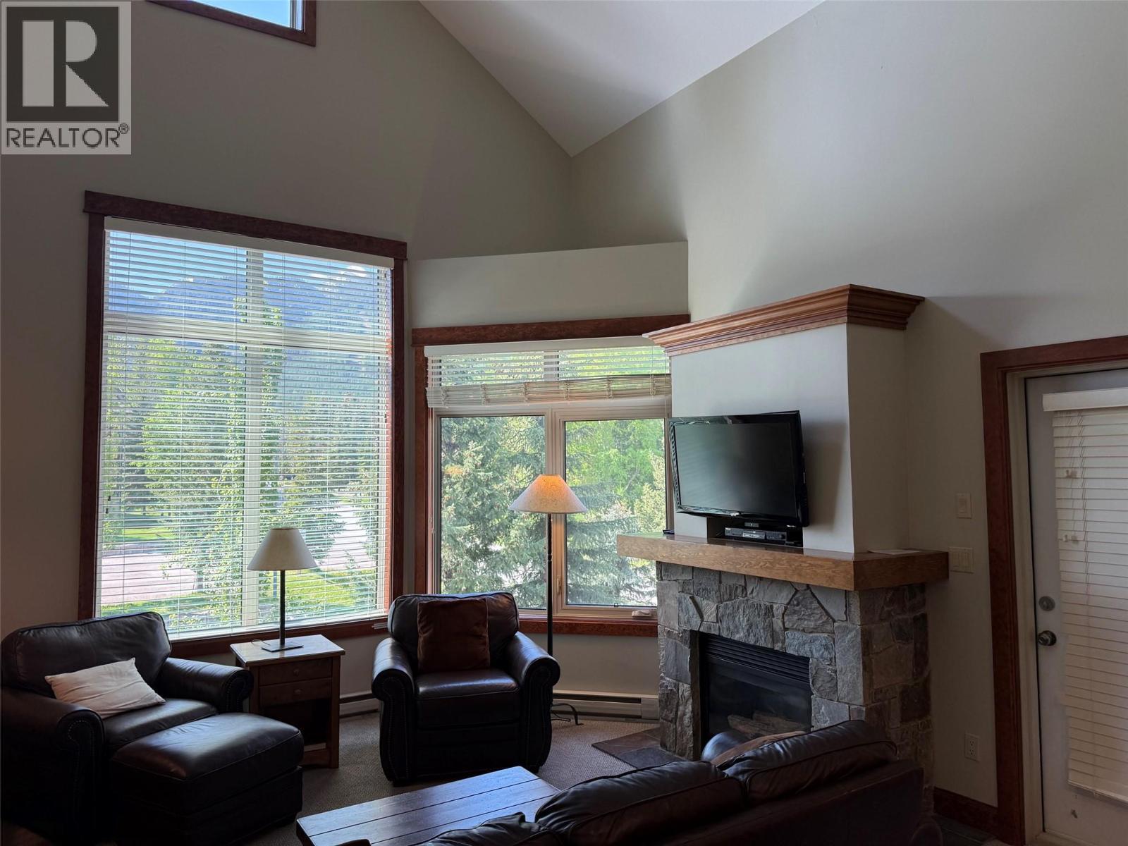 4559 Timberline Crescent Unit# 545A, Fernie, BC - Indoor Photo Showing Living Room With Fireplace