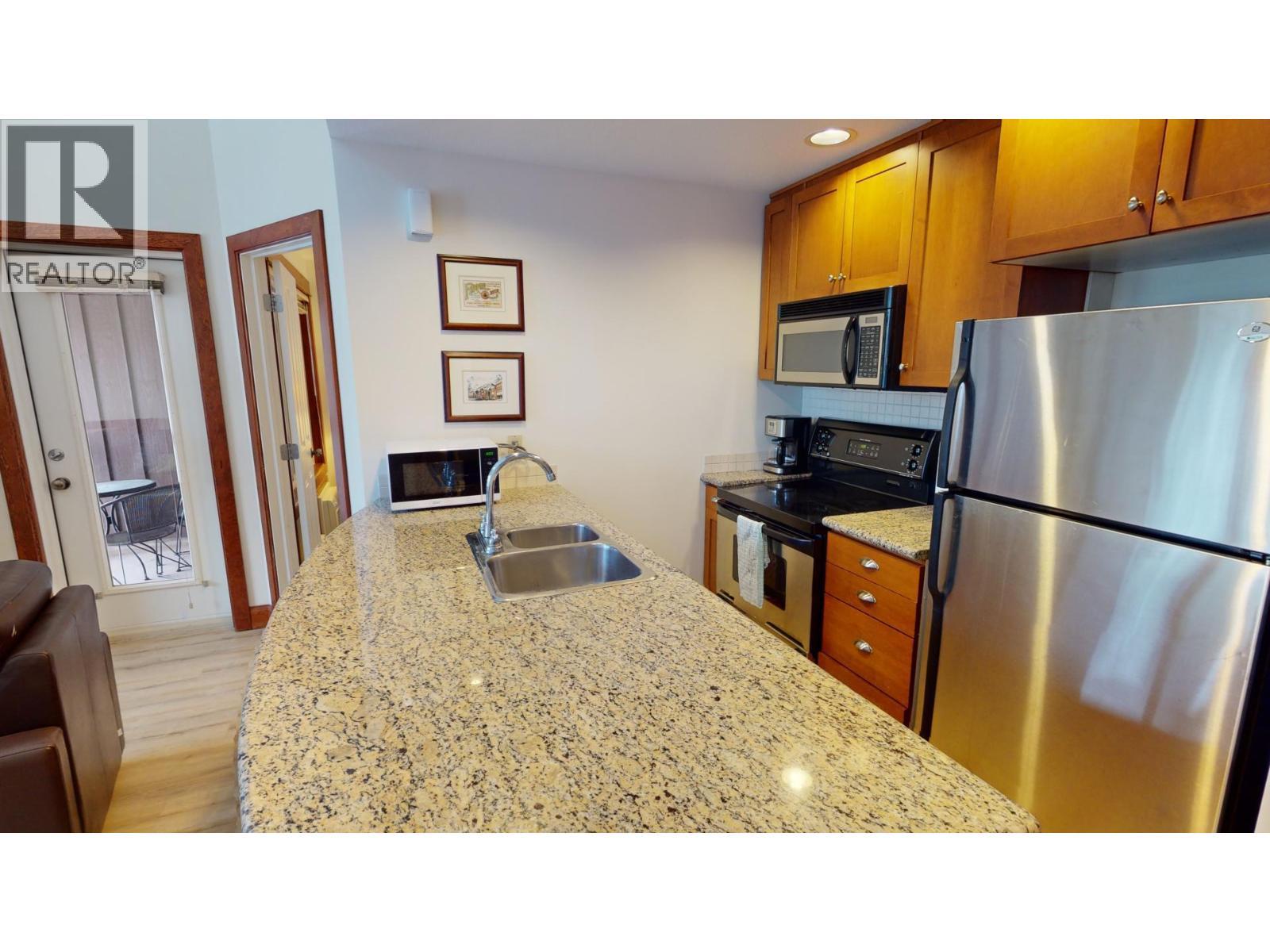 4559 Timberline Crescent Unit# 545A, Fernie, BC - Indoor Photo Showing Kitchen With Double Sink