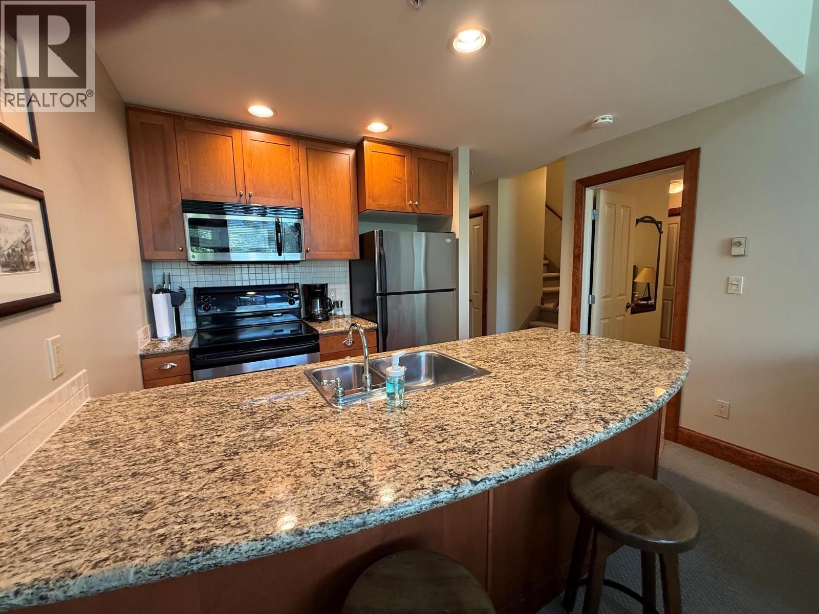 4559 Timberline Crescent Unit# 545A, Fernie, BC - Indoor Photo Showing Kitchen With Double Sink