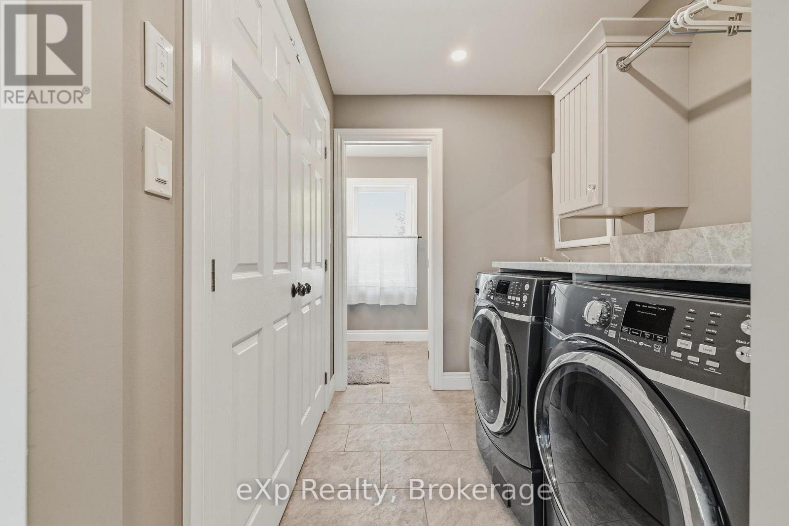 Main floor launry with 2-pc Bath - 100 Harris Crescent, Southgate, ON - Indoor Photo Showing Laundry Room