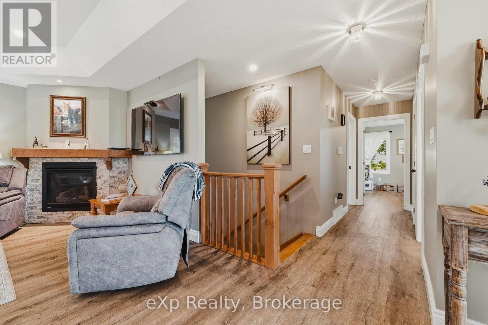 100 Harris Crescent, Southgate, ON - Indoor Photo Showing Living Room With Fireplace