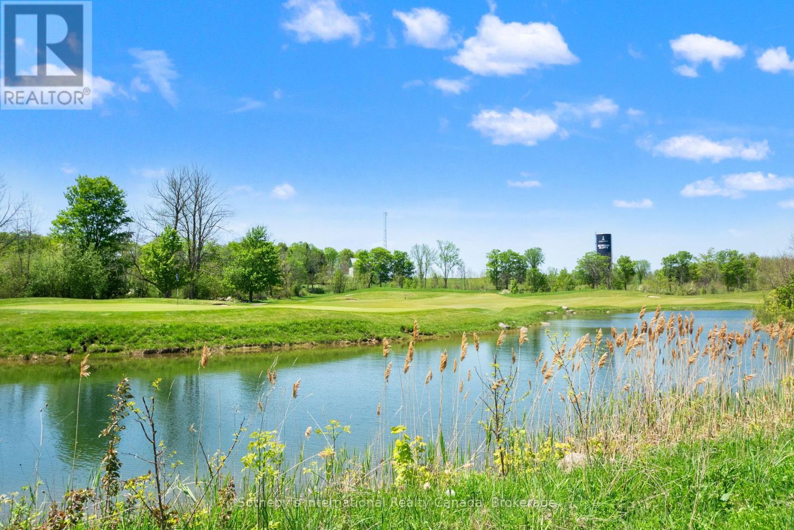 Pond Between Subject Property and 12th Green - 208 Snowberry Lane, Georgian Bluffs, ON