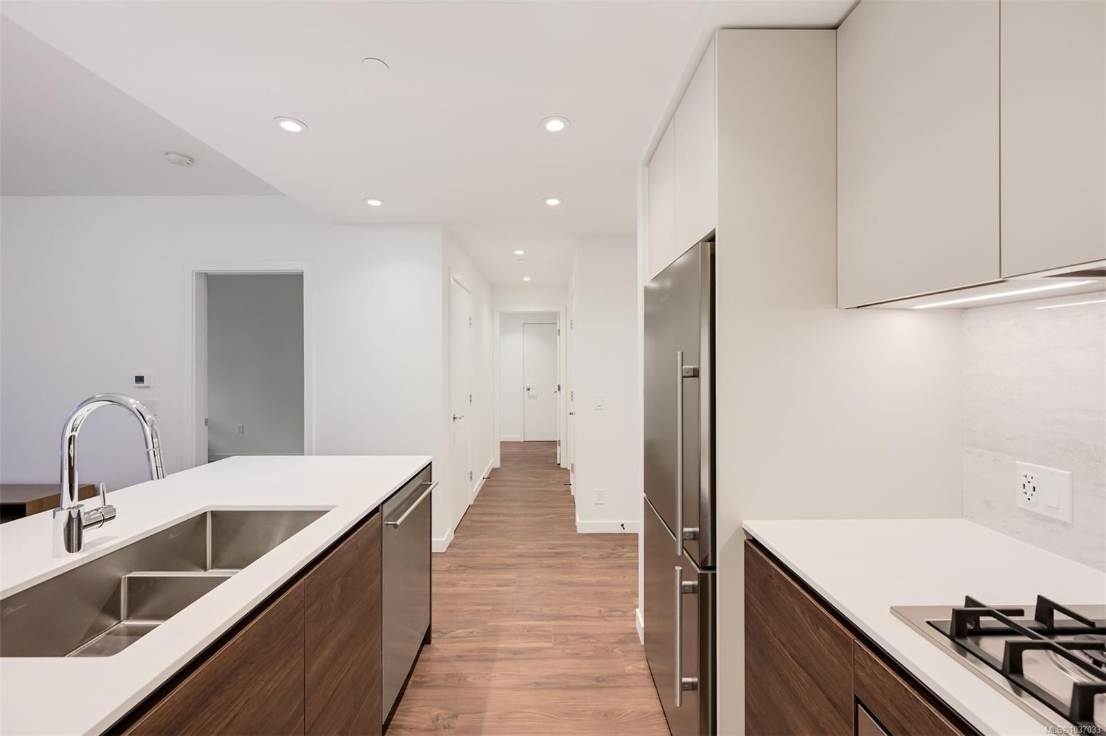 #204-363 Tyee Rd, Victoria, BC - Indoor Photo Showing Kitchen With Double Sink