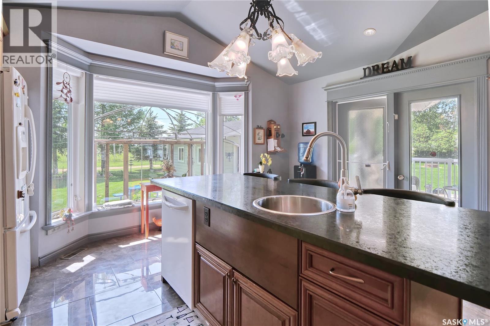105 Sargent Crescent, Lake Diefenbaker, SK - Indoor Photo Showing Kitchen With Double Sink