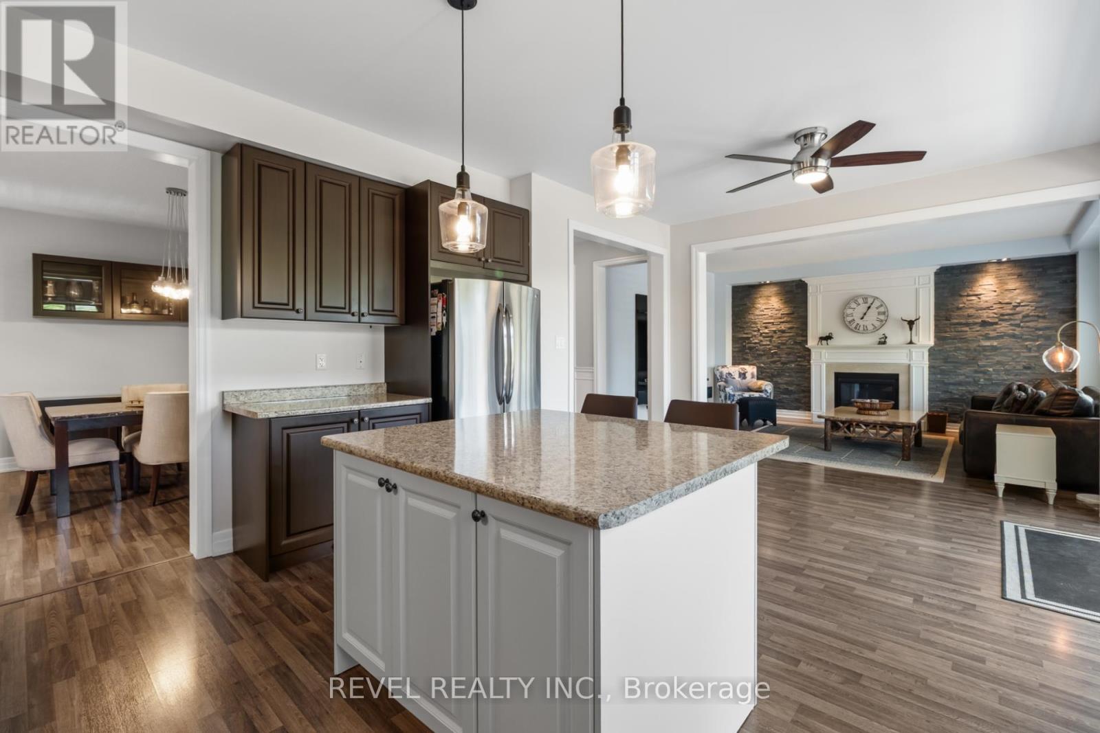 74 Mount Crescent, Essa, ON - Indoor Photo Showing Kitchen With Fireplace