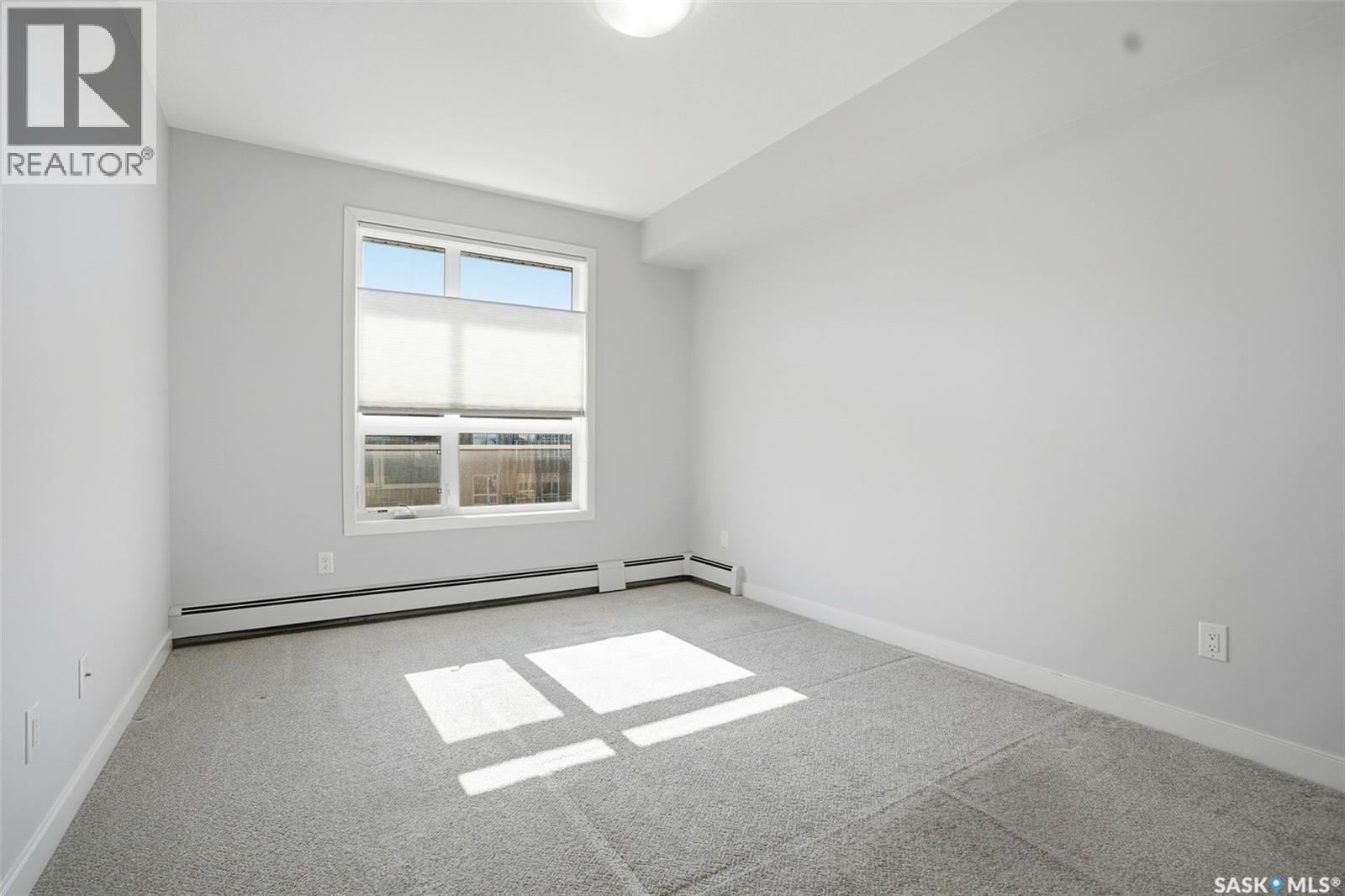 303 1025 Moss Avenue, Saskatoon, SK - Indoor Photo Showing Other Room
