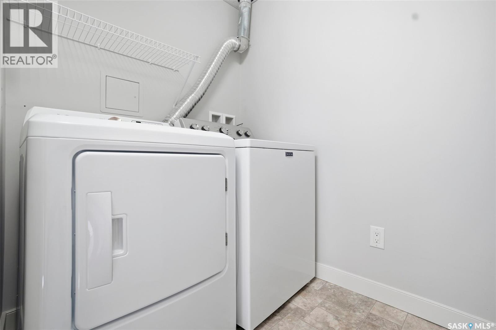 303 1025 Moss Avenue, Saskatoon, SK - Indoor Photo Showing Laundry Room