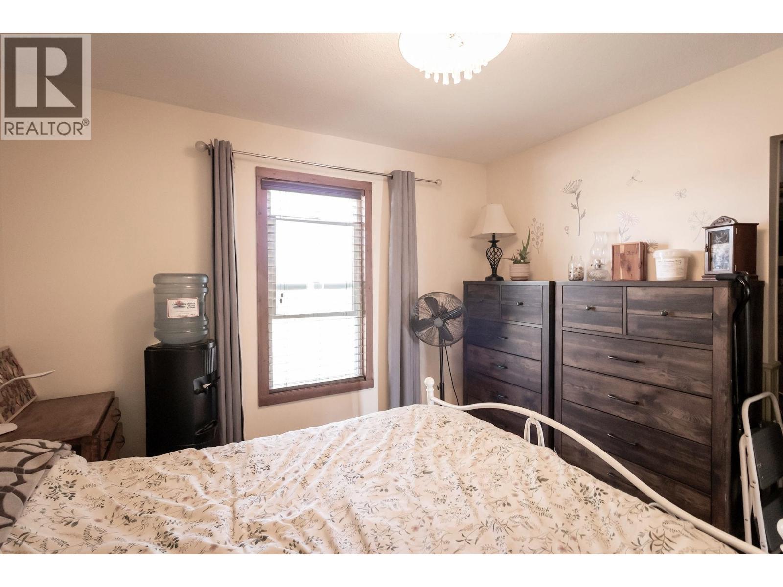 1016 240 Road, Fort St. John, BC - Indoor Photo Showing Bedroom