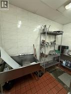 Stainless steel three-compartment sink with integrated drainboard -
