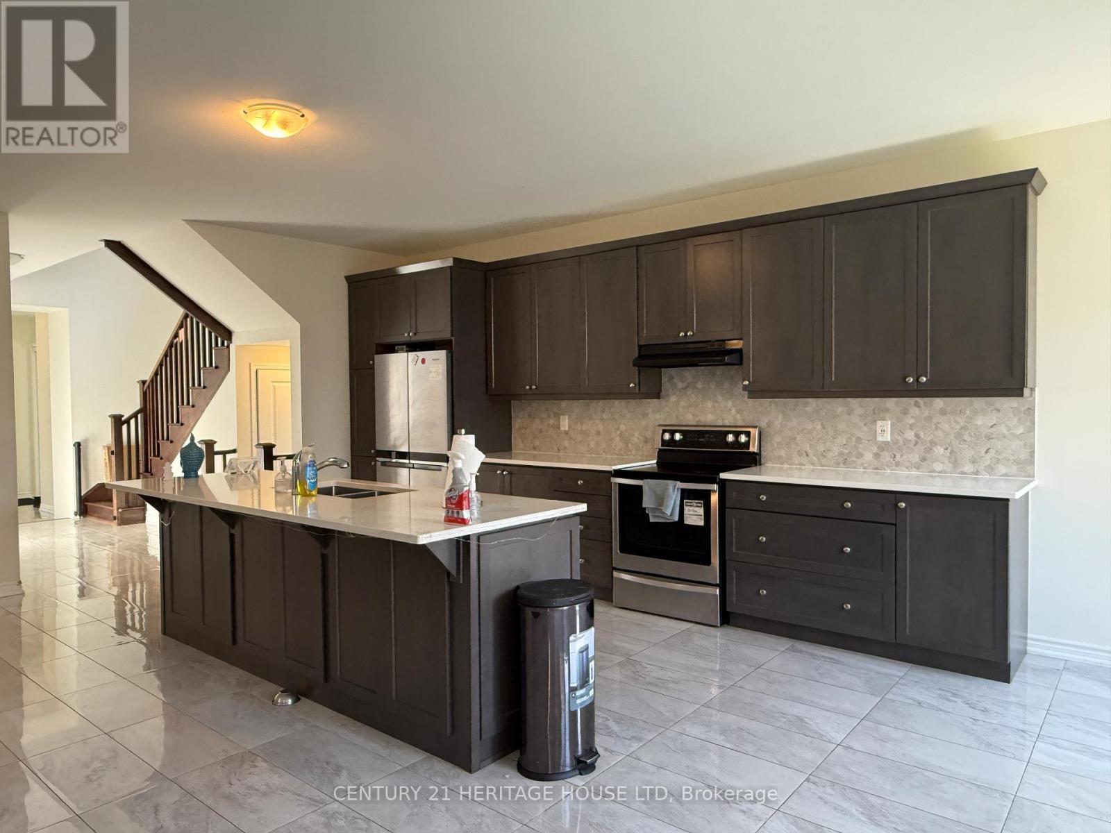 18 Dolucci Crescent E, Brampton, ON - Indoor Photo Showing Kitchen With Double Sink