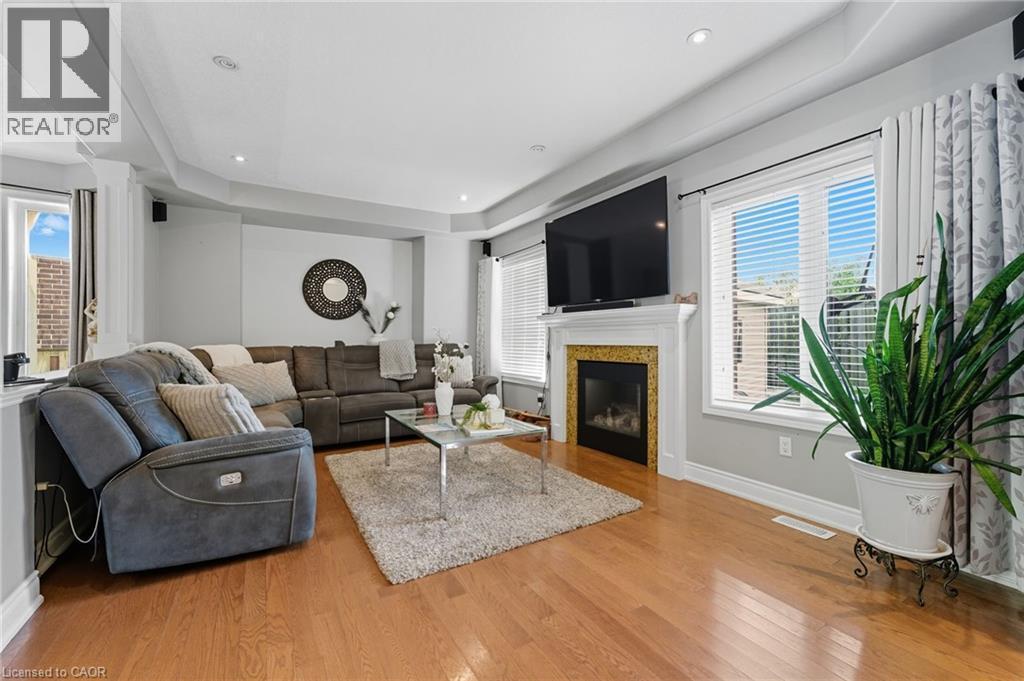 23 Kellogg Avenue, Hamilton, ON - Indoor Photo Showing Living Room With Fireplace