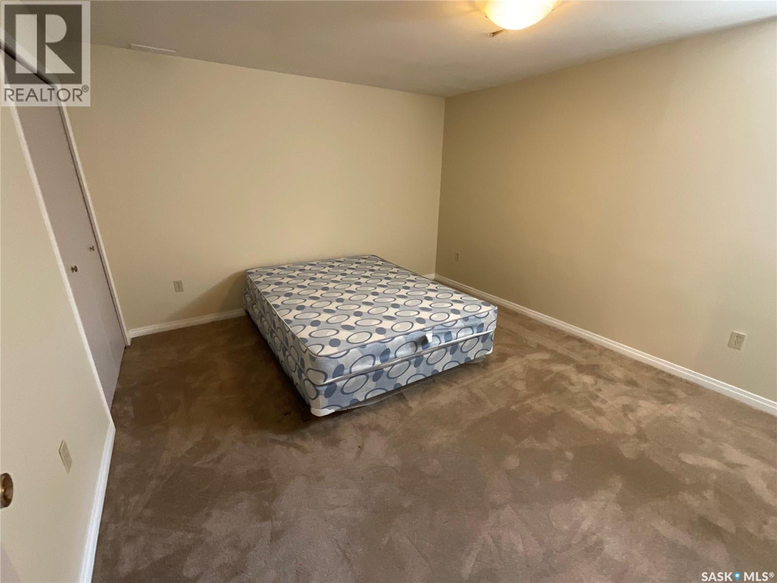 207 7Th Street S, Wakaw, SK - Indoor Photo Showing Bedroom