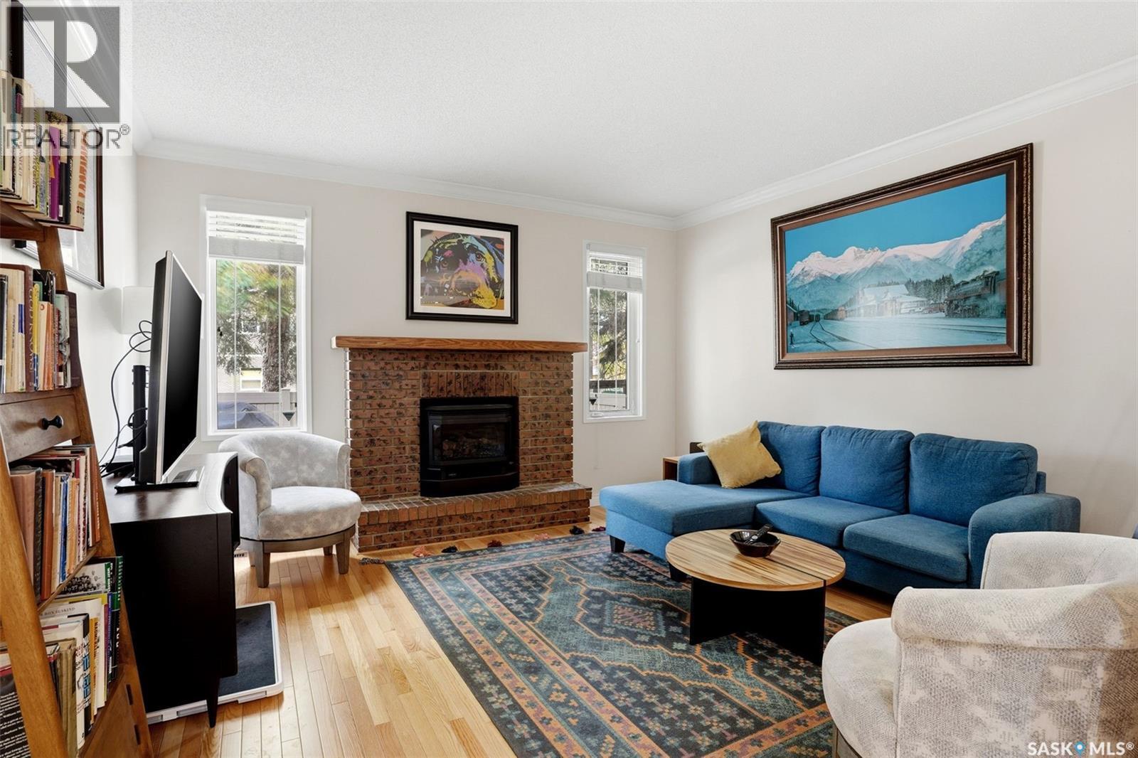 2231 Mcintyre Street, Regina, SK - Indoor Photo Showing Living Room With Fireplace