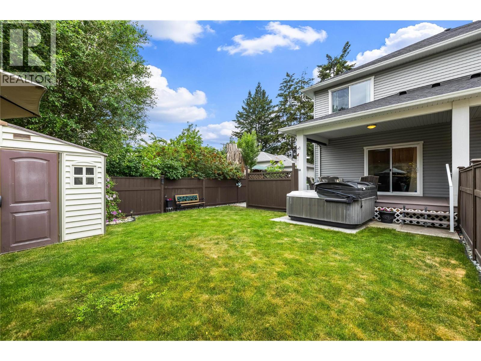 Backyard Shed for Storage - 827 Juniper Road, Kelowna, BC - Outdoor With Deck Patio Veranda