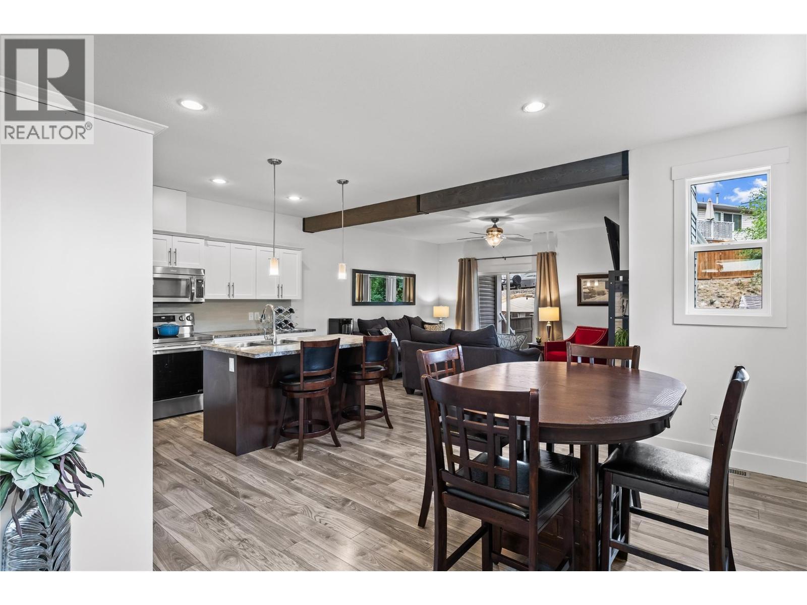 Blended Open Concept: Kitchen, Dining and Great-Room - 827 Juniper Road, Kelowna, BC - Indoor Photo Showing Dining Room