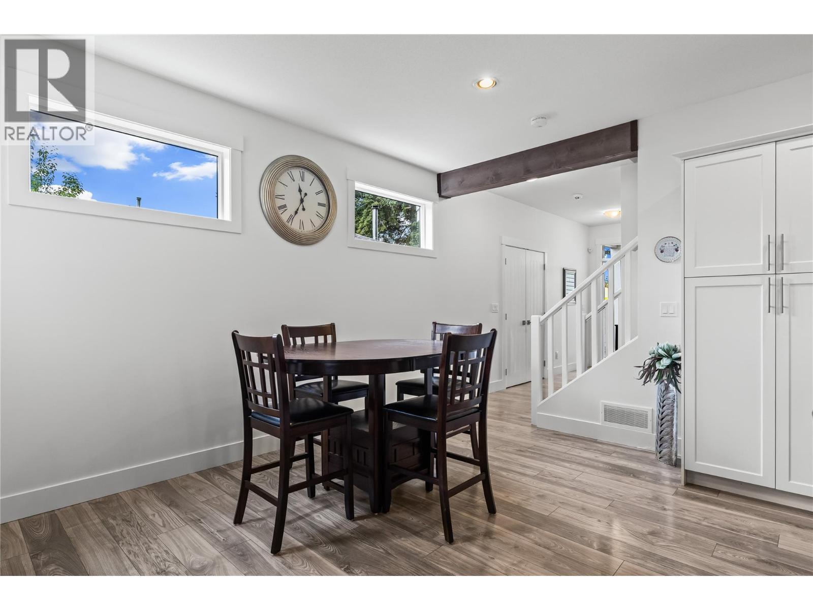 Spacious Dining Area for Large Table and Plenty of Seating - 827 Juniper Road, Kelowna, BC - Indoor Photo Showing Dining Room