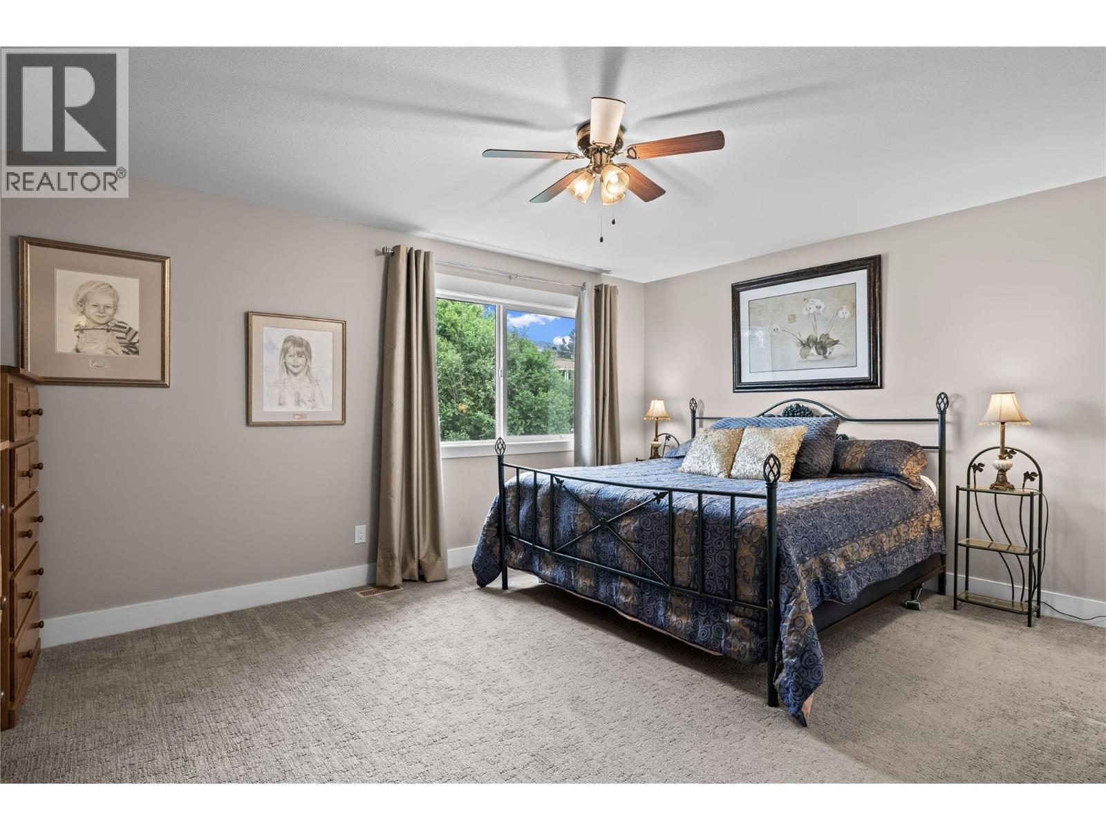 Bright and Spacious King Size Primary Bedroom - 827 Juniper Road, Kelowna, BC - Indoor Photo Showing Bedroom