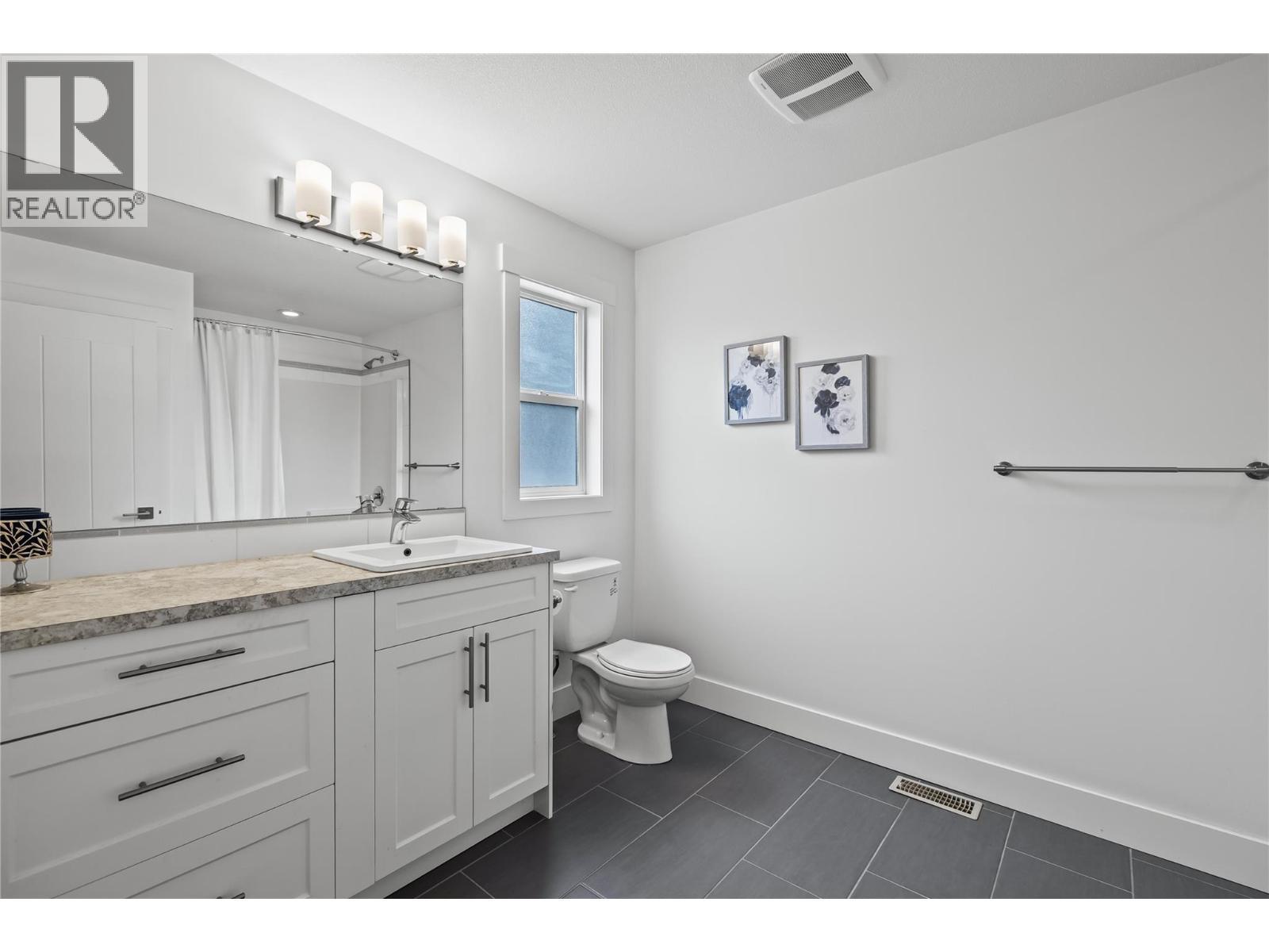 Primary - Sleek White Oversized Ensuite - 827 Juniper Road, Kelowna, BC - Indoor Photo Showing Bathroom