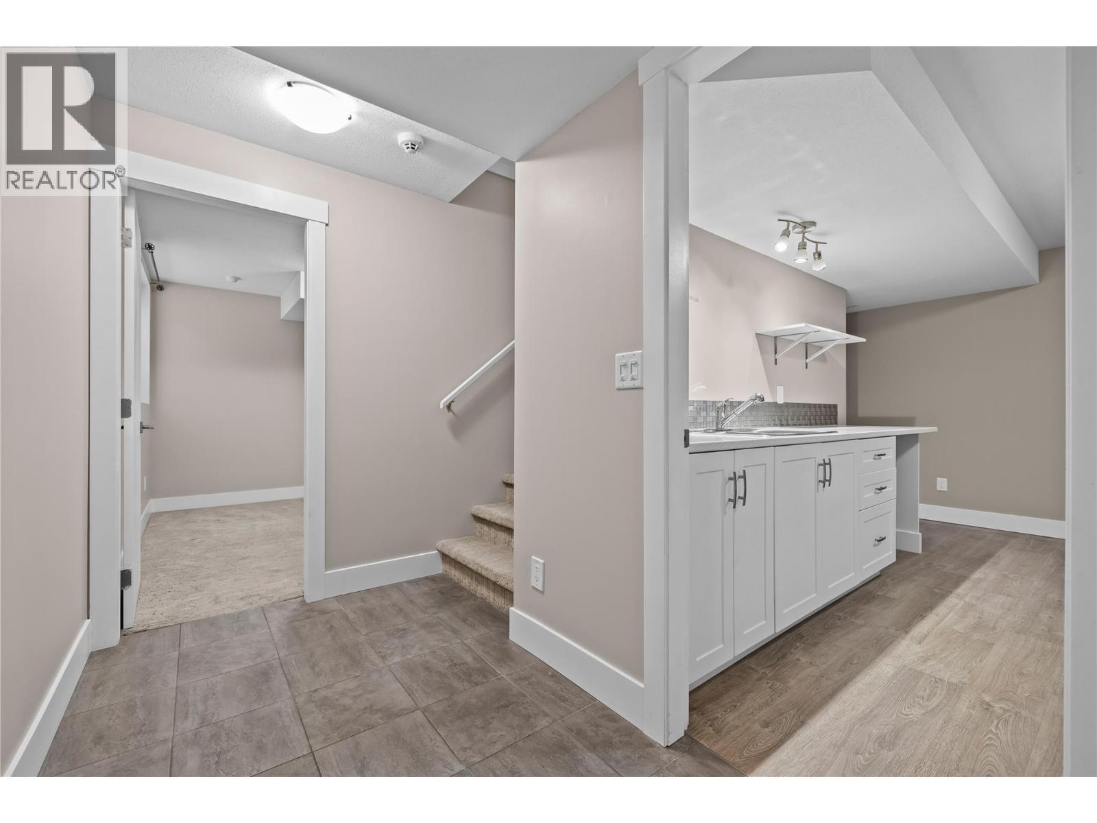 Finished Basement Landing to Bedroom - 827 Juniper Road, Kelowna, BC - Indoor