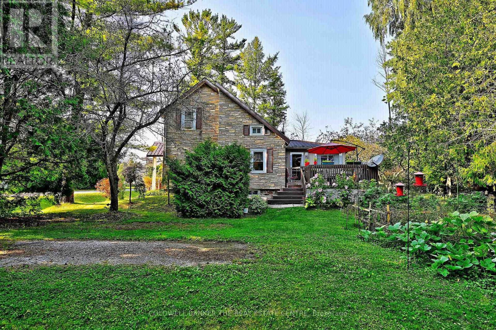 view of driveway 2 with access to side porch - 20805 Brock Road, Brock, ON - Outdoor