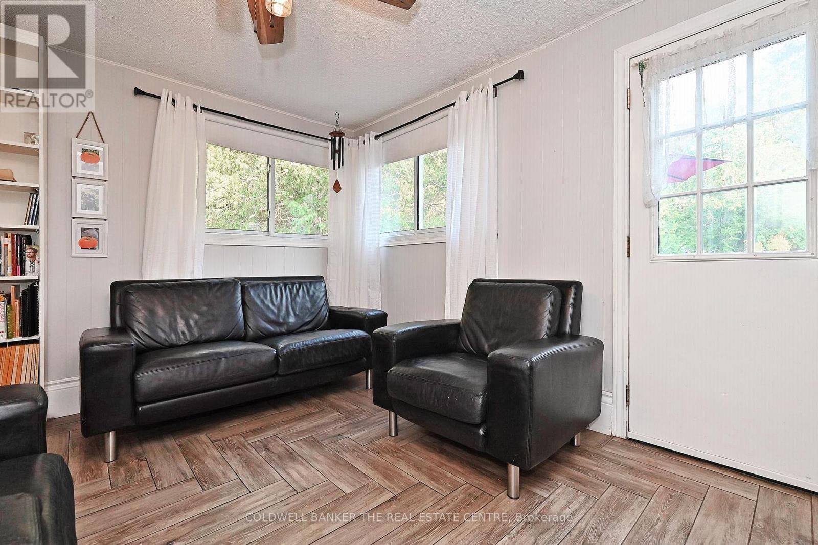 step inside to family room - 20805 Brock Road, Brock, ON - Indoor Photo Showing Living Room