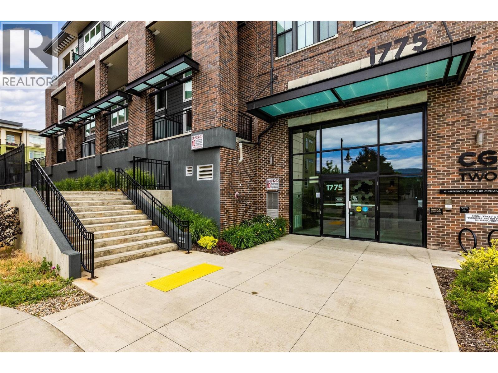 Contemporary architecture in the sought-after Central Green 2 community. - 1775 Chapman Place Unit# 101, Kelowna, BC - Outdoor
