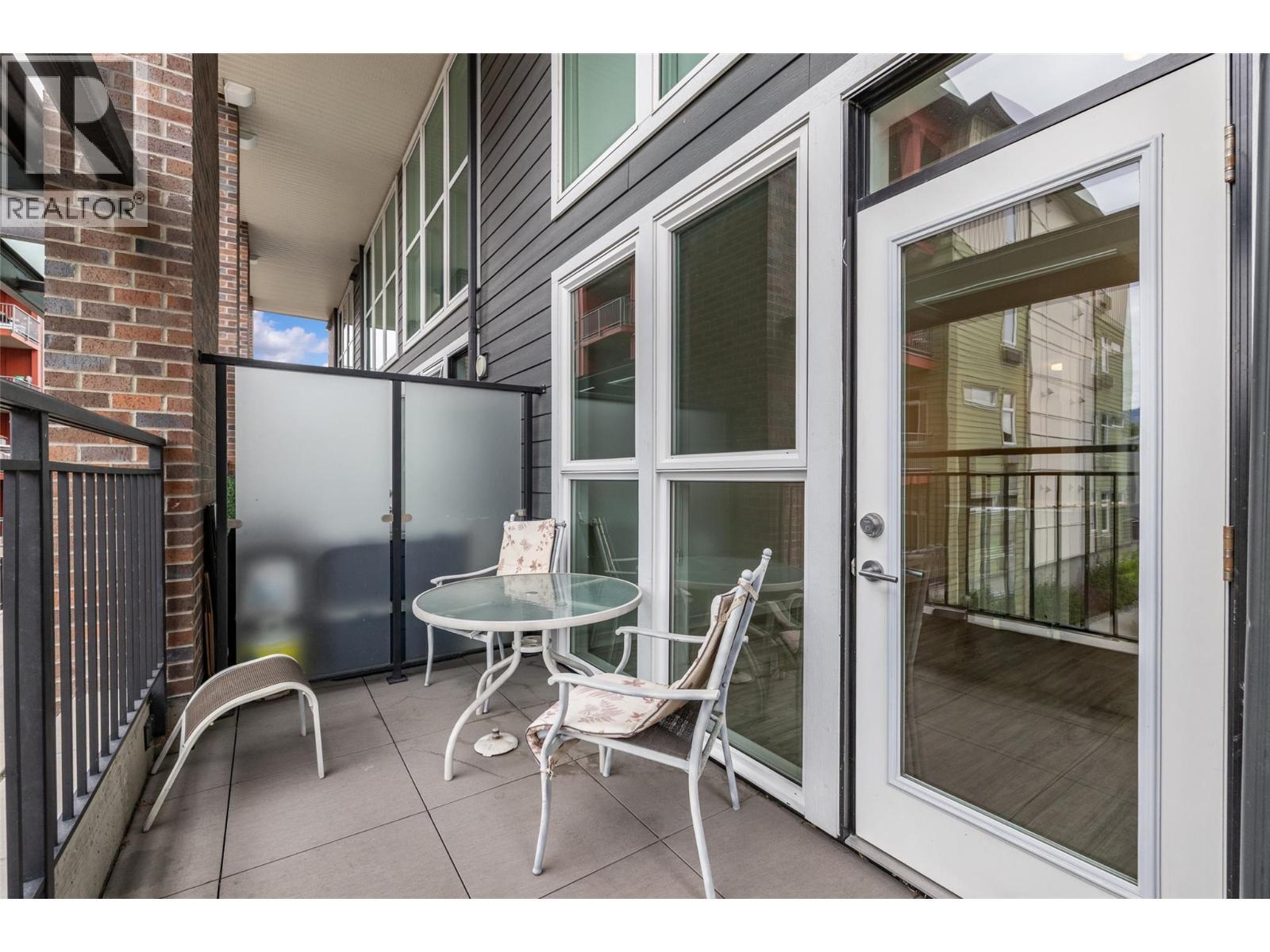 Private outdoor space perfect for morning coffee or evening relaxation. - 1775 Chapman Place Unit# 101, Kelowna, BC - Outdoor With Exterior