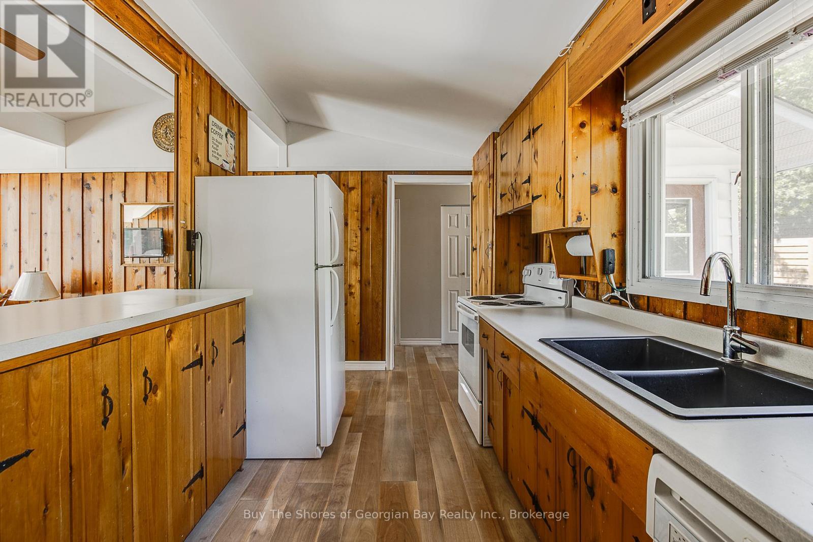 8 Nassau Court, Tiny, ON - Indoor Photo Showing Kitchen With Double Sink