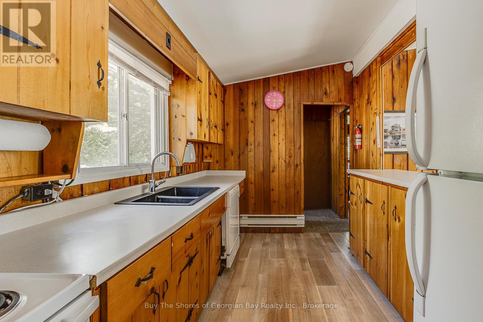 8 Nassau Court, Tiny, ON - Indoor Photo Showing Kitchen With Double Sink