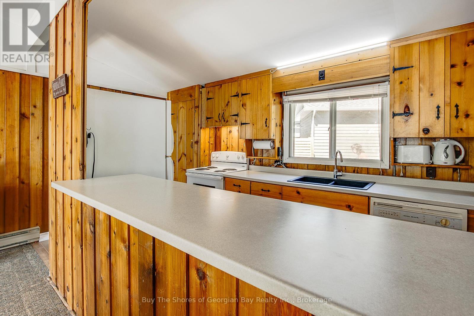 8 Nassau Court, Tiny, ON - Indoor Photo Showing Kitchen With Double Sink